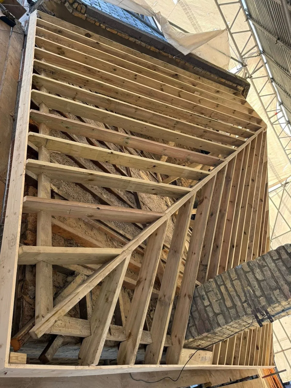 New roof timbers and rafters during a re-roof in Mousehole